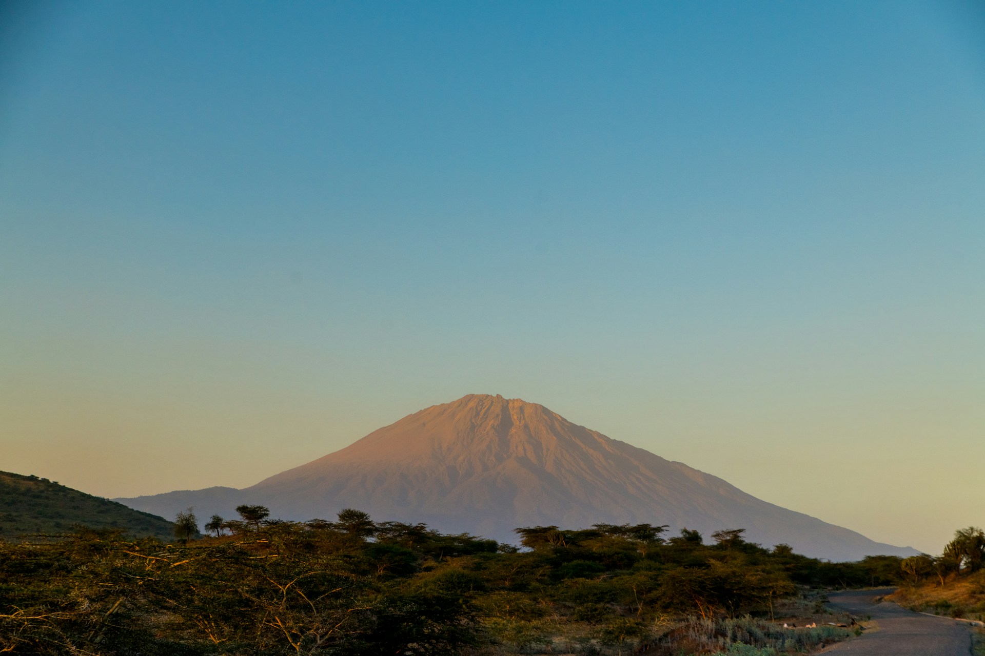 Mount Meru rising above Arusha Tanzania
