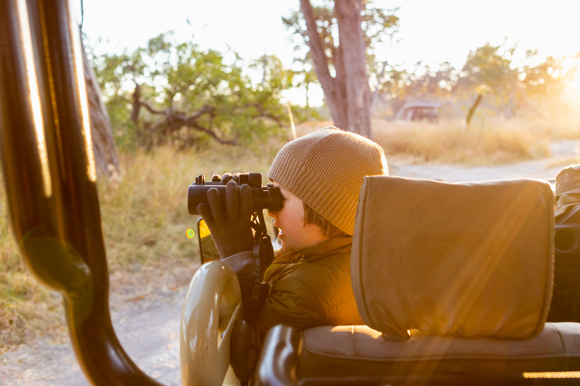 Private safari traveler exploring wilderness in custom 4x4 cruiser